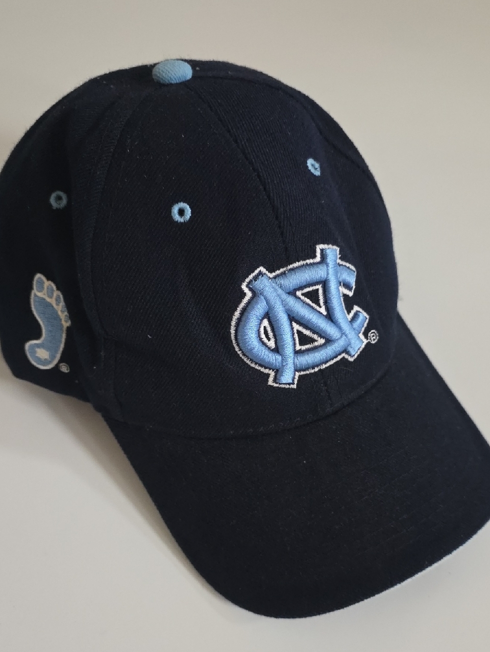 North Carolina Tar Heels Black and Carolina Blue Logo Baseball Cap